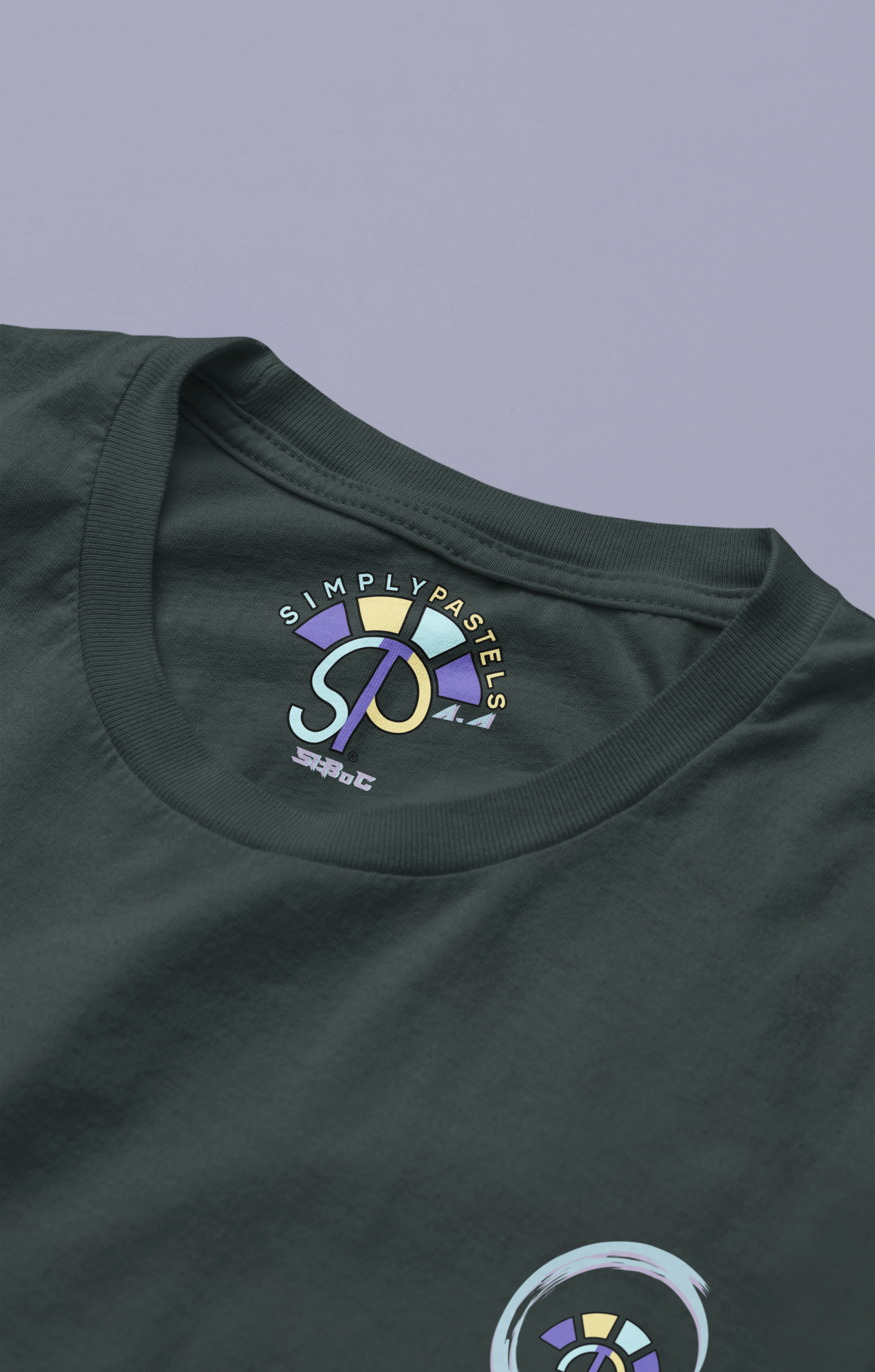 Label view of the black Avid Aspiration cotton t-shirt with a pastel graphic design from Simply Pastels, a UK-based premium ethical clothing brand.