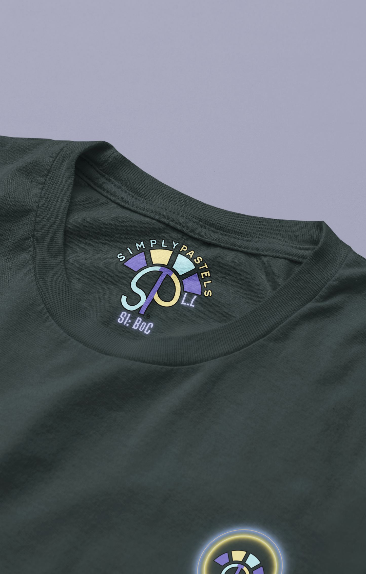Label view of the black Limitless Levels cotton t-shirt with a pastel graphic design, from Simply Pastels, a UK-based premium ethical clothing brand.