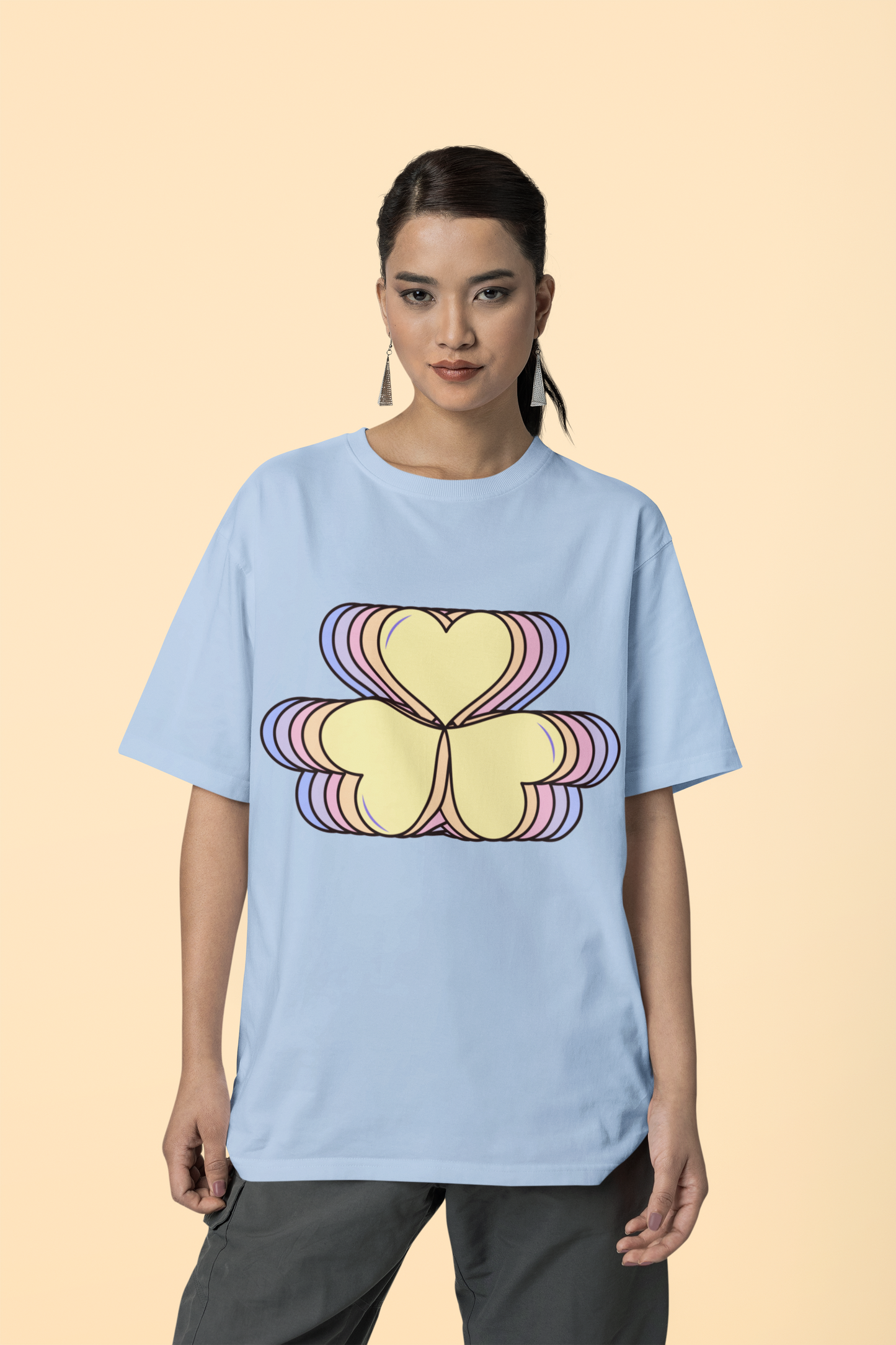 Front view of the blue soul Amorelle  organic cotton t-shirt with a pastel graphic design, from Simply Pastels, a UK-based premium ethical clothing brand.