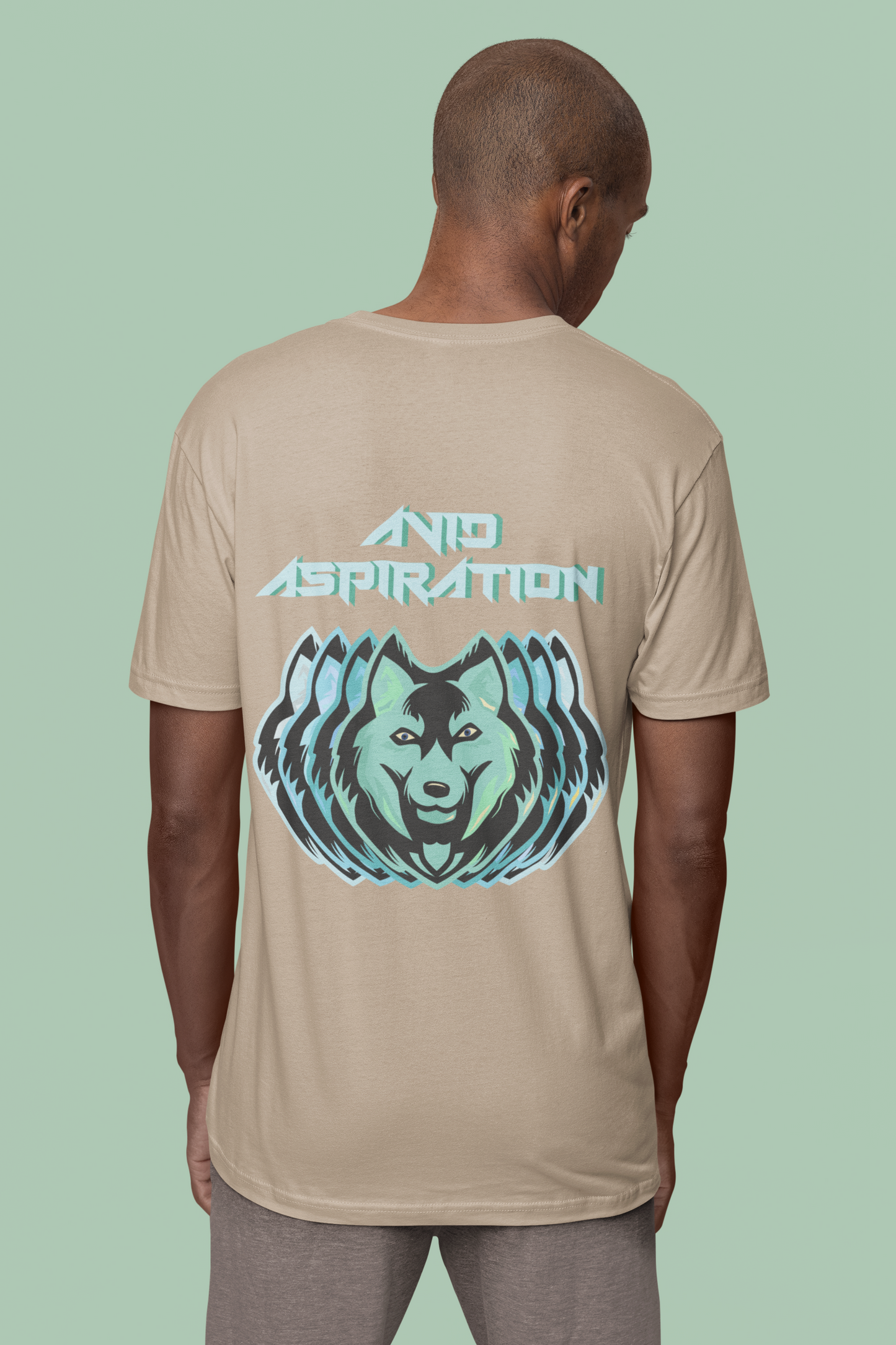 Back view of the desert dust Avid Aspiration  organic cotton t-shirt with a pastel graphic design, from Simply Pastels, a UK-based premium ethical clothing brand.