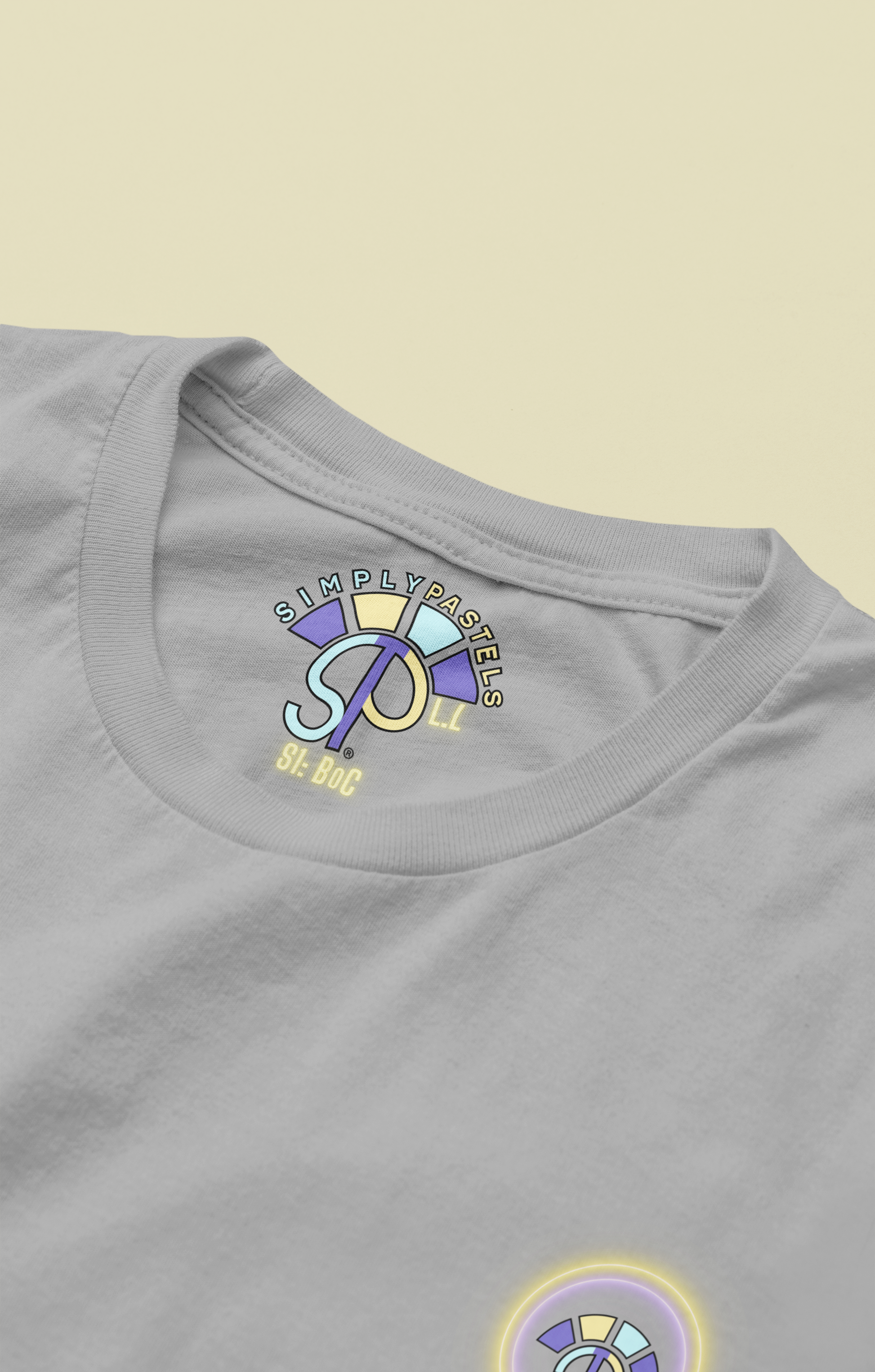 Label view of the heather grey Limitless Levels organic cotton t-shirt with a pastel graphic design, from Simply Pastels, a UK-based premium ethical clothing brand.