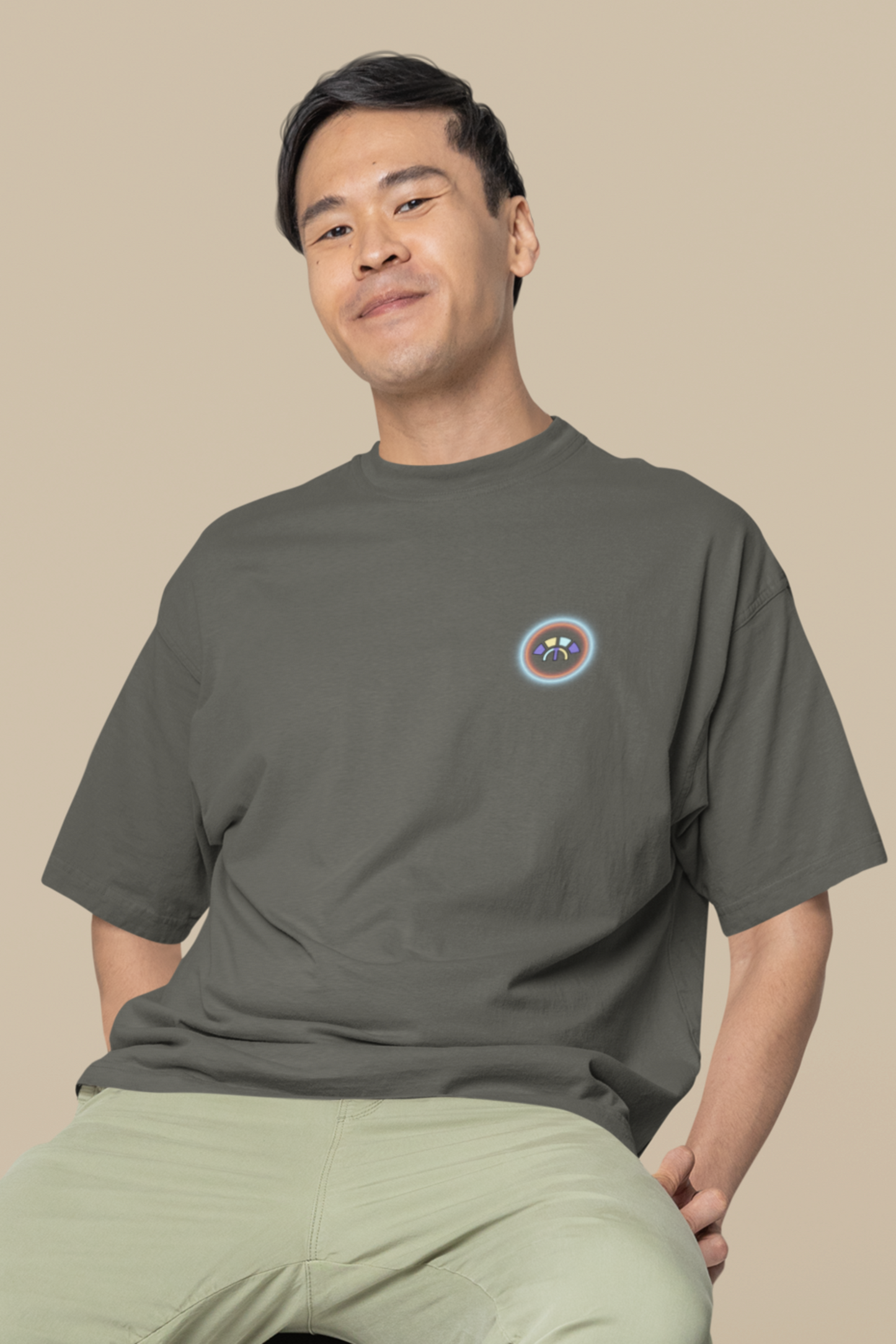 Front view of the khaki Limitless Levels organic cotton t-shirt with a pastel graphic design, from Simply Pastels, a UK-based premium ethical clothing brand.