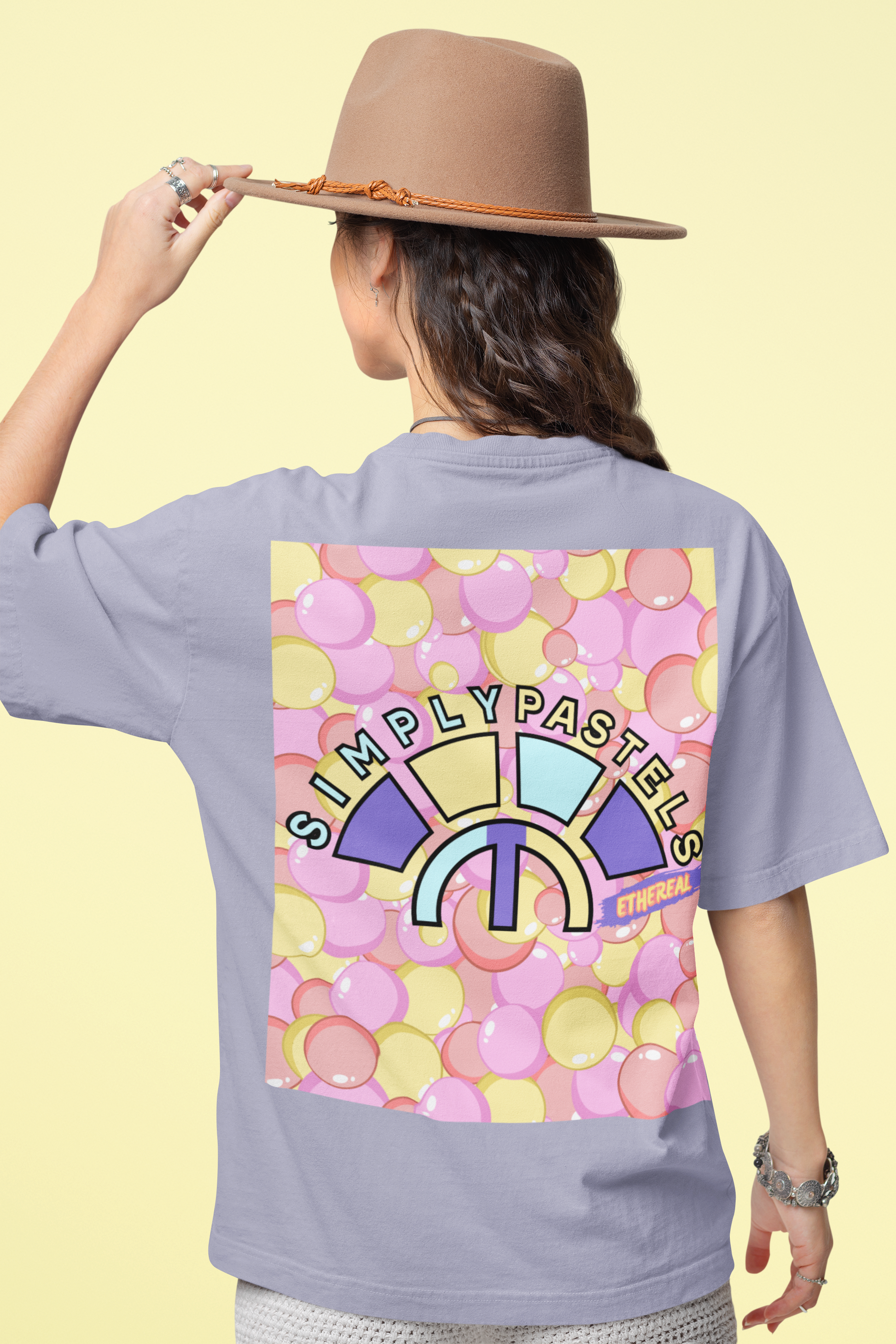 Back view of the lavender Ethereal organic cotton t-shirt with a pastel graphic design, from Simply Pastels, a UK-based premium ethical clothing brand.