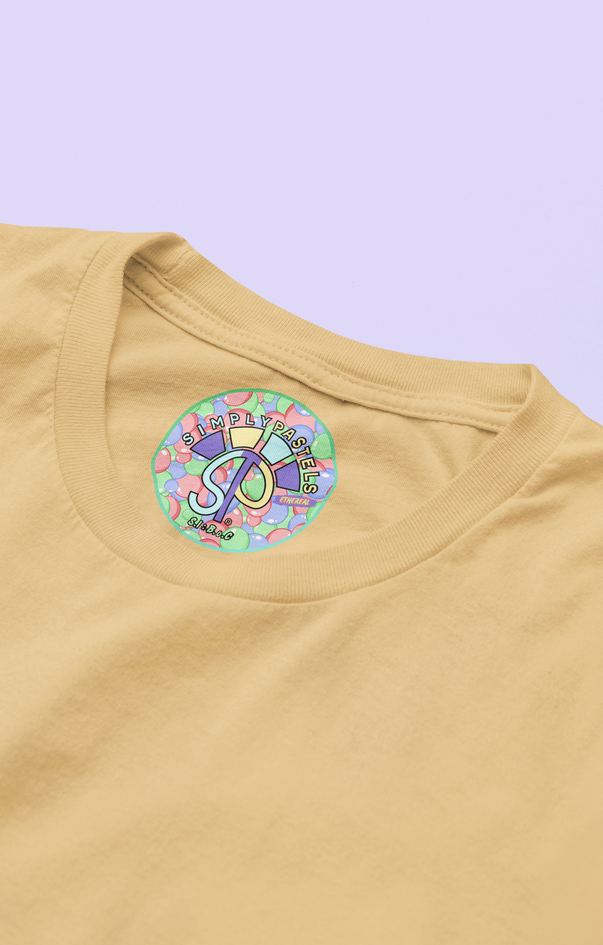 Label view of the nispero Ethereal organic cotton t-shirt with a pastel graphic design, from Simply Pastels, a UK-based premium ethical clothing brand.
