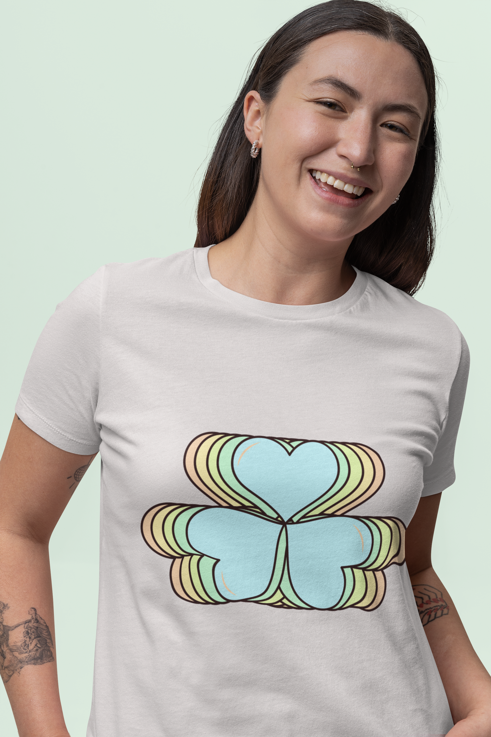 Front view of the off-white Amorelle organic cotton t-shirt with a pastel graphic design, from Simply Pastels, a UK-based premium ethical clothing brand.