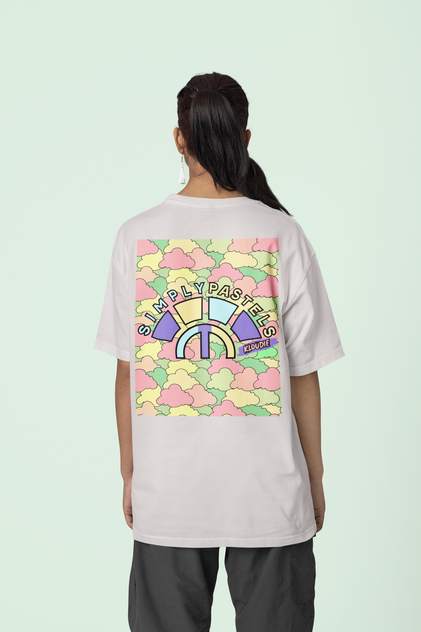 Back view of the off-white Kloudie organic cotton t-shirt with a pastel graphic design, from Simply Pastels, a UK-based premium ethical clothing brand.
