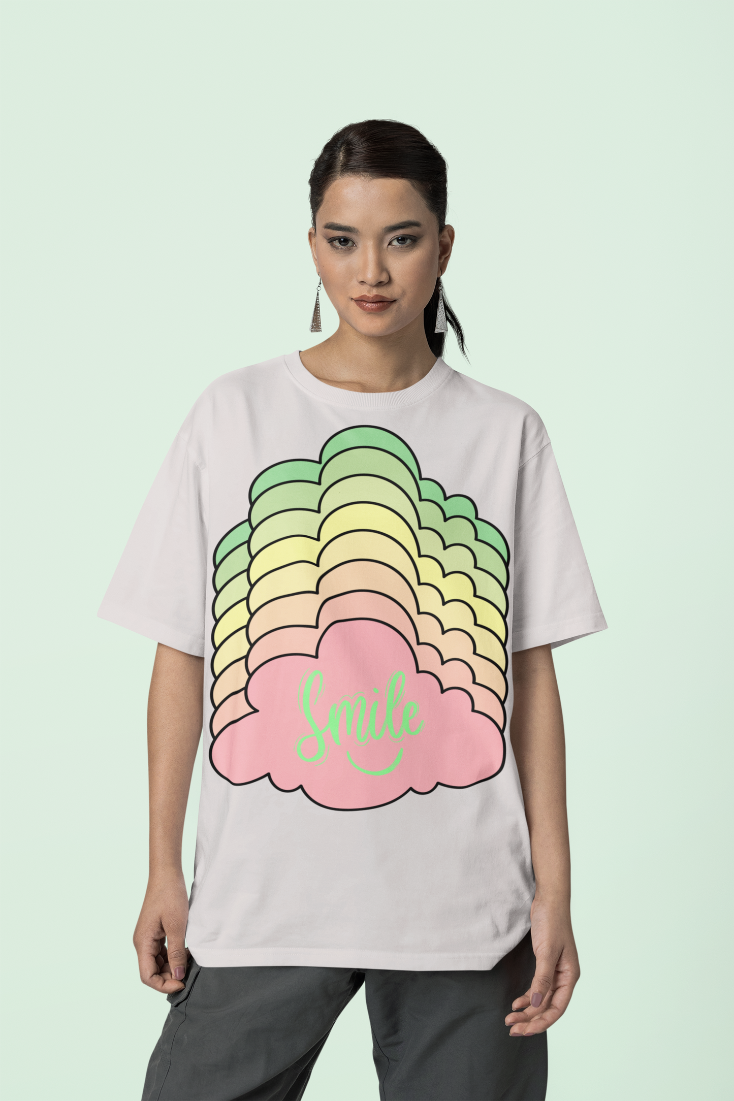 Front view of the off-white Kloudie organic cotton t-shirt with a pastel graphic design, from Simply Pastels, a UK-based premium ethical clothing brand.