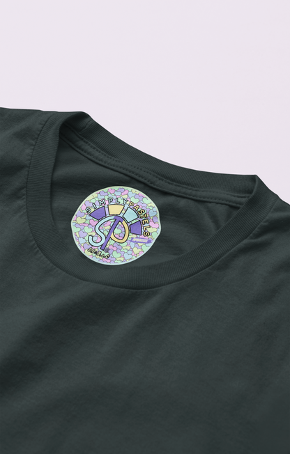 Label view of the black Amorelle organic cotton t-shirt with a pastel graphic design, from Simply Pastels, a UK-based premium ethical clothing brand.