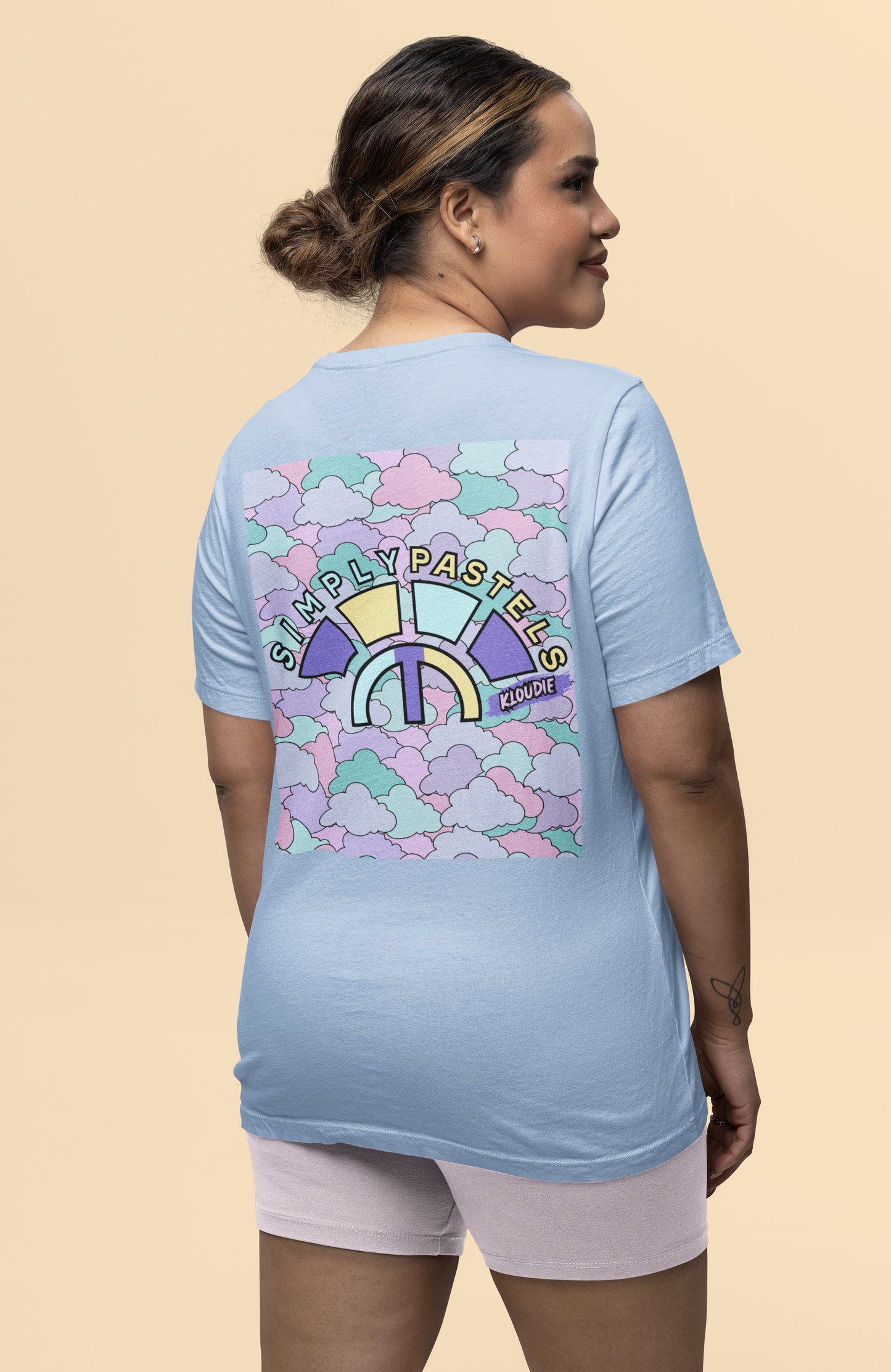 Back view of the blue soul Kloudie organic cotton t-shirt with a pastel graphic design, from Simply Pastels, a UK-based premium ethical clothing brand.
