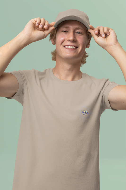 Front view of the desert dust Decisive Determination organic cotton t-shirt with a pastel graphic design, from Simply Pastels, a UK-based premium ethical clothing brand.