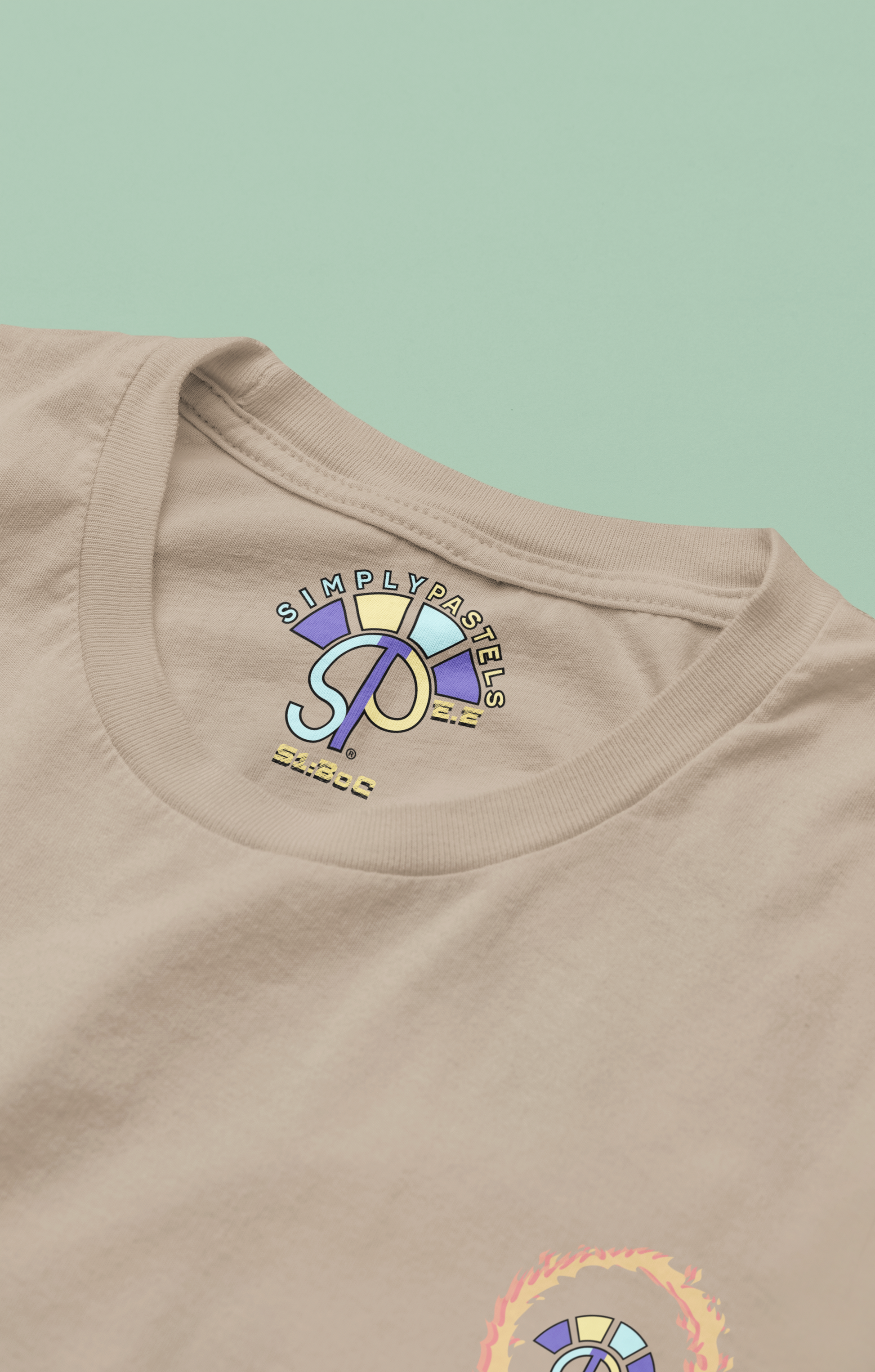 Label view of the desert dust Eternal Essence organic cotton t-shirt with a pastel graphic design, from Simply Pastels, a UK-based premium ethical clothing brand.