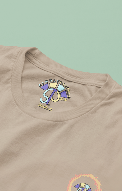Label view of the desert dust Eternal Essence organic cotton t-shirt with a pastel graphic design, from Simply Pastels, a UK-based premium ethical clothing brand.
