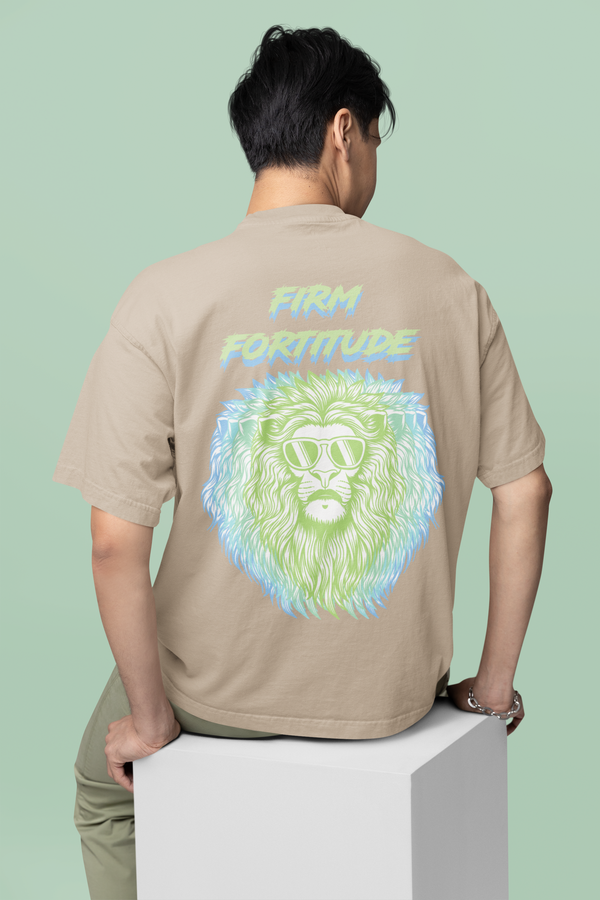 Back view of the desert dust Firm Fortitude organic cotton t-shirt with a pastel graphic design, from Simply Pastels, a UK-based premium ethical clothing brand.