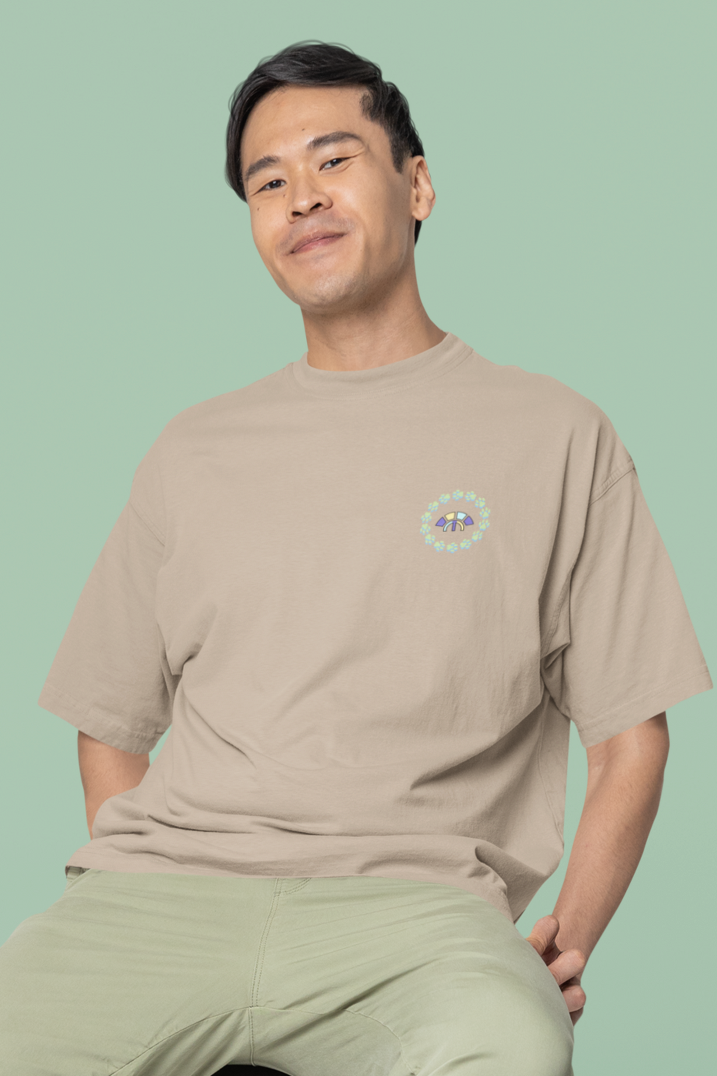 Front view of the desert dust Firm Fortitude organic cotton t-shirt with a pastel graphic design, from Simply Pastels, a UK-based premium ethical clothing brand.