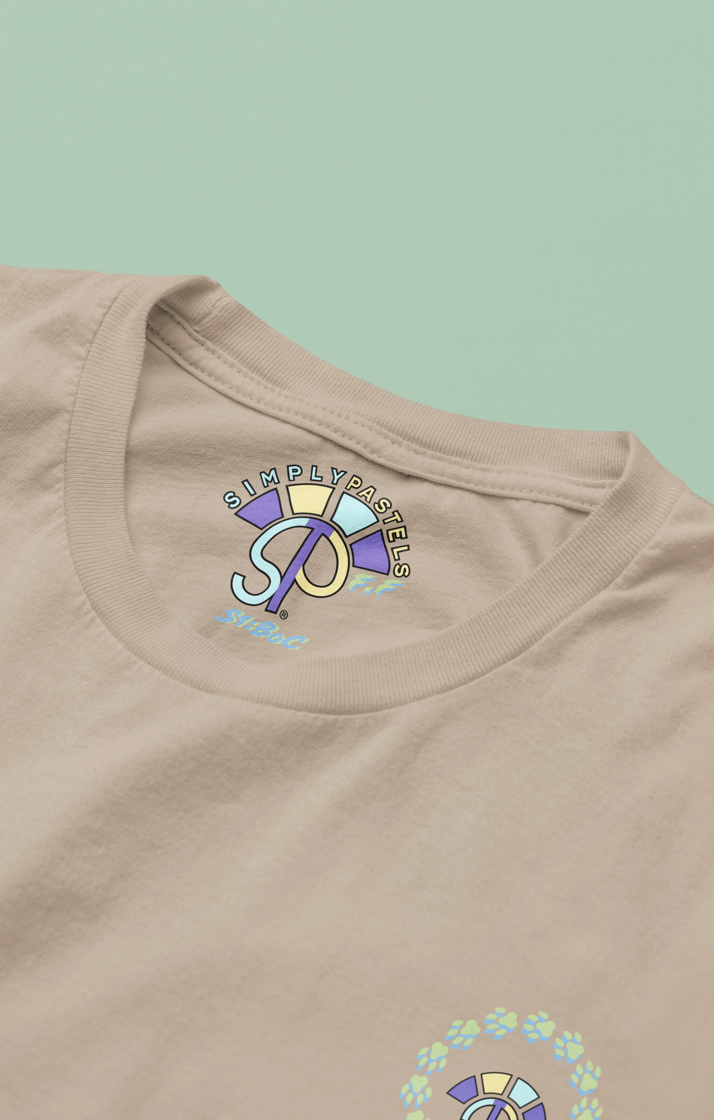 Label view of the desert dust Firm Fortitude organic cotton t-shirt with a pastel graphic design, from Simply Pastels, a UK-based premium ethical clothing brand.