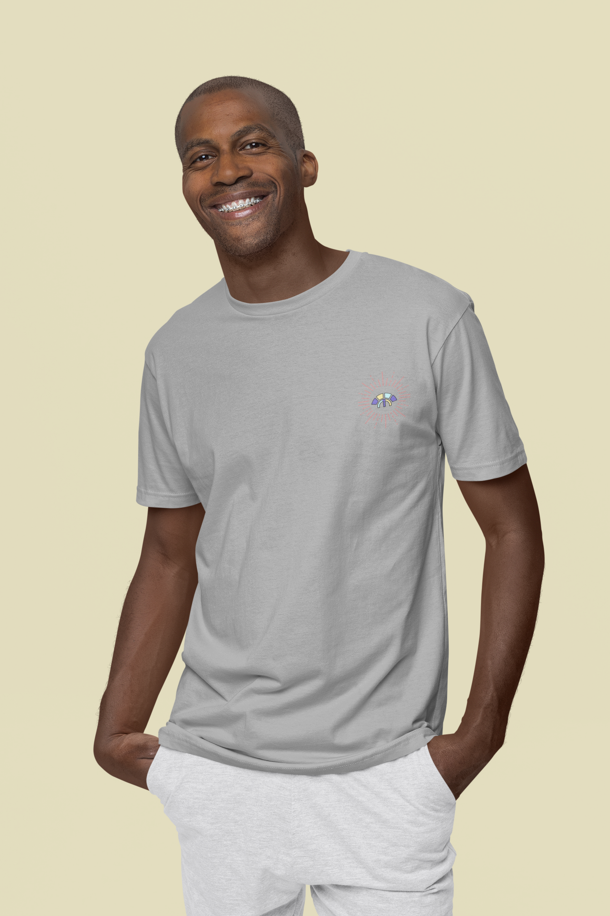 Front view of the heather grey Decisive Determination organic cotton t-shirt with a pastel graphic design, from Simply Pastels, a UK-based premium ethical clothing brand.