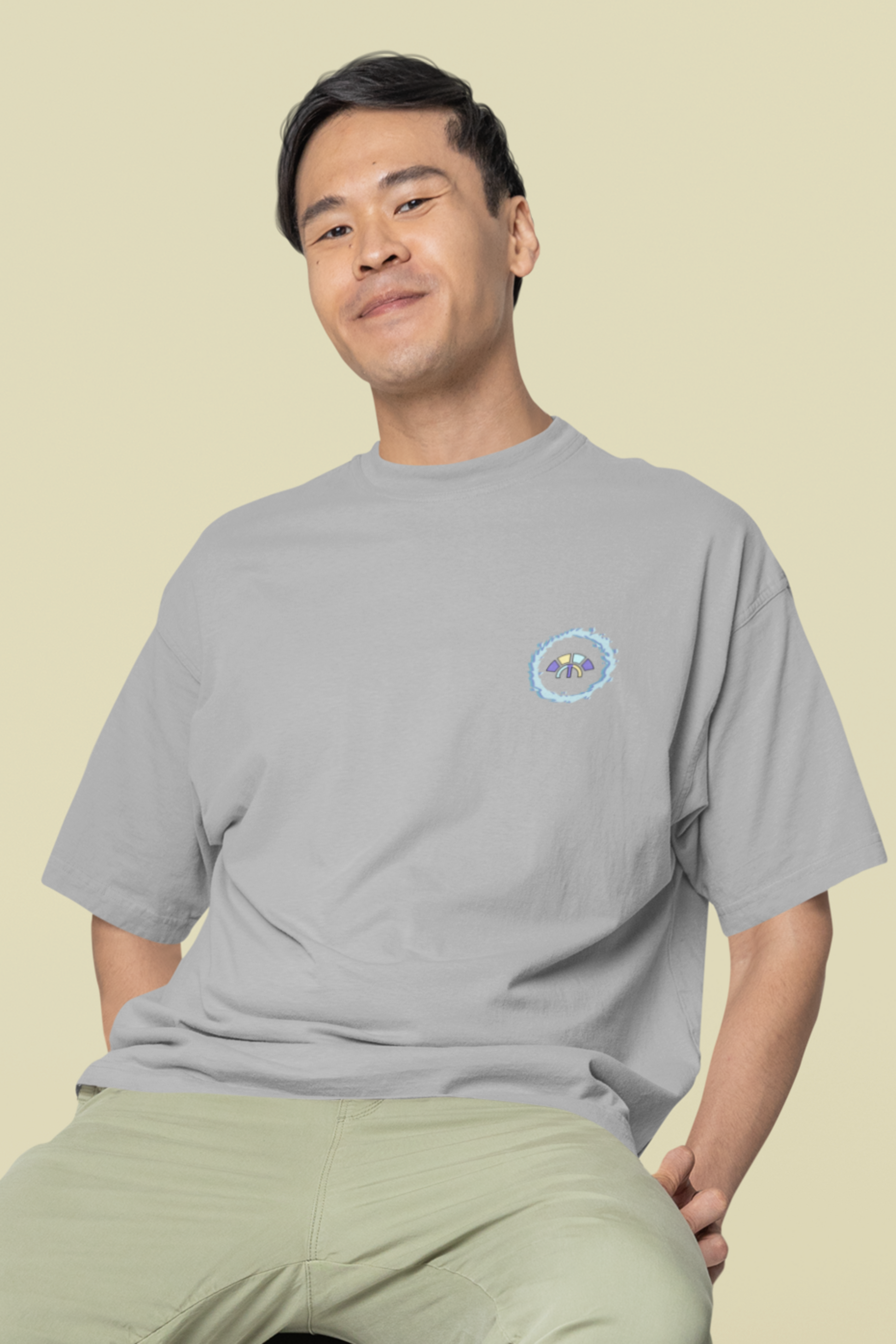 Front view of the heather grey Eternal Essence organic cotton t-shirt with a pastel graphic design, from Simply Pastels, a UK-based premium ethical clothing brand.