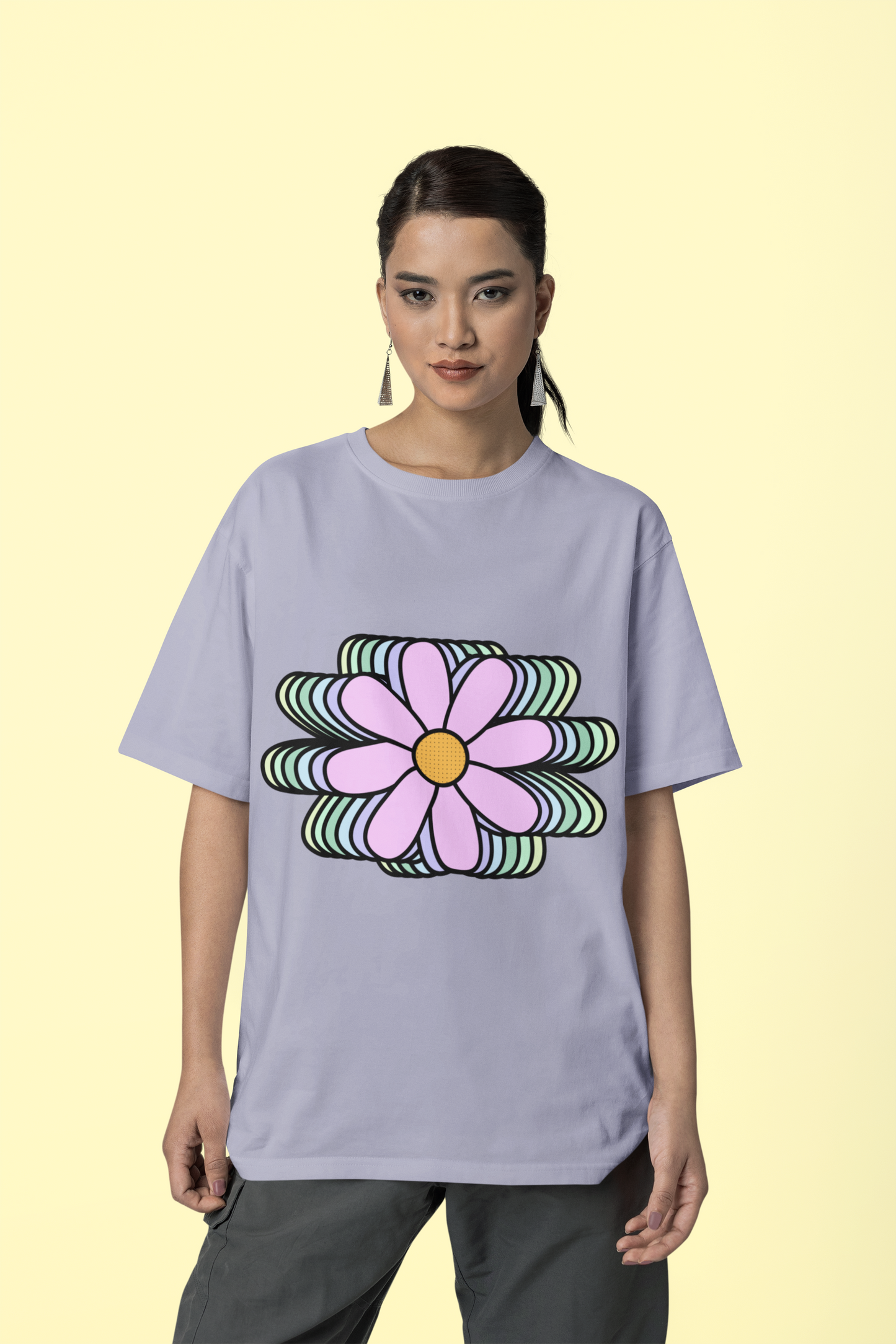 Front view of the lavender Bloomlets organic cotton t-shirt with a pastel graphic design, from Simply Pastels, a UK-based premium ethical clothing brand.