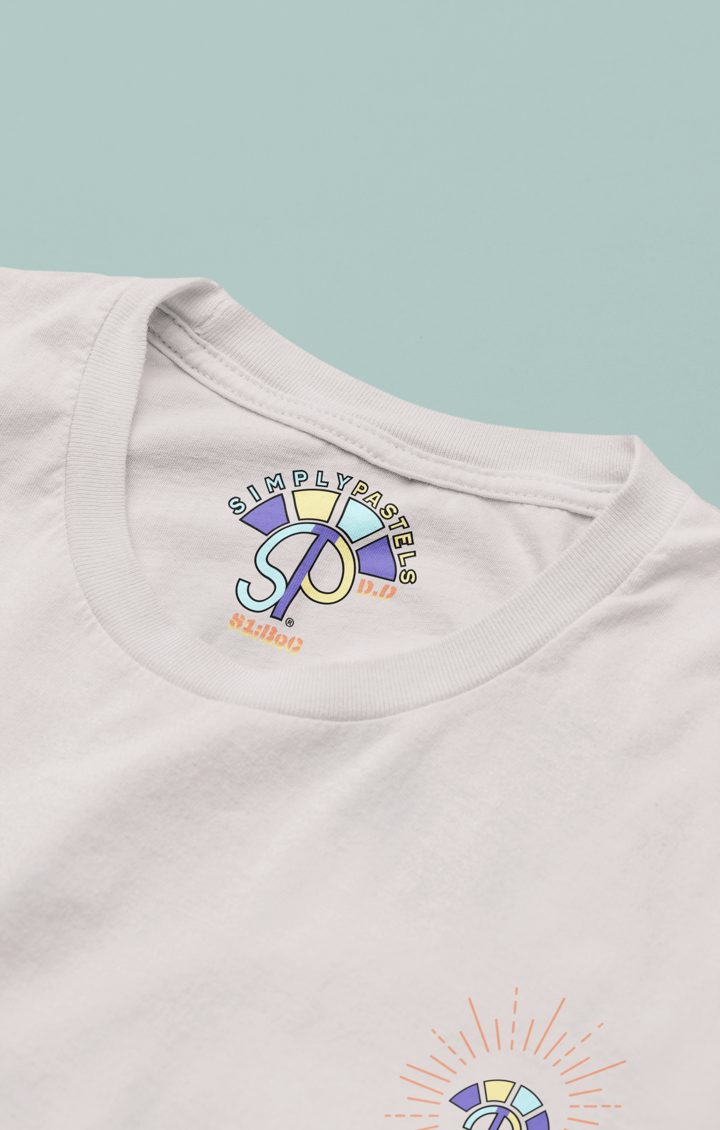 Label view of the off-white Decisive Determination organic cotton t-shirt with a pastel graphic design, from Simply Pastels, a UK-based premium ethical clothing brand.