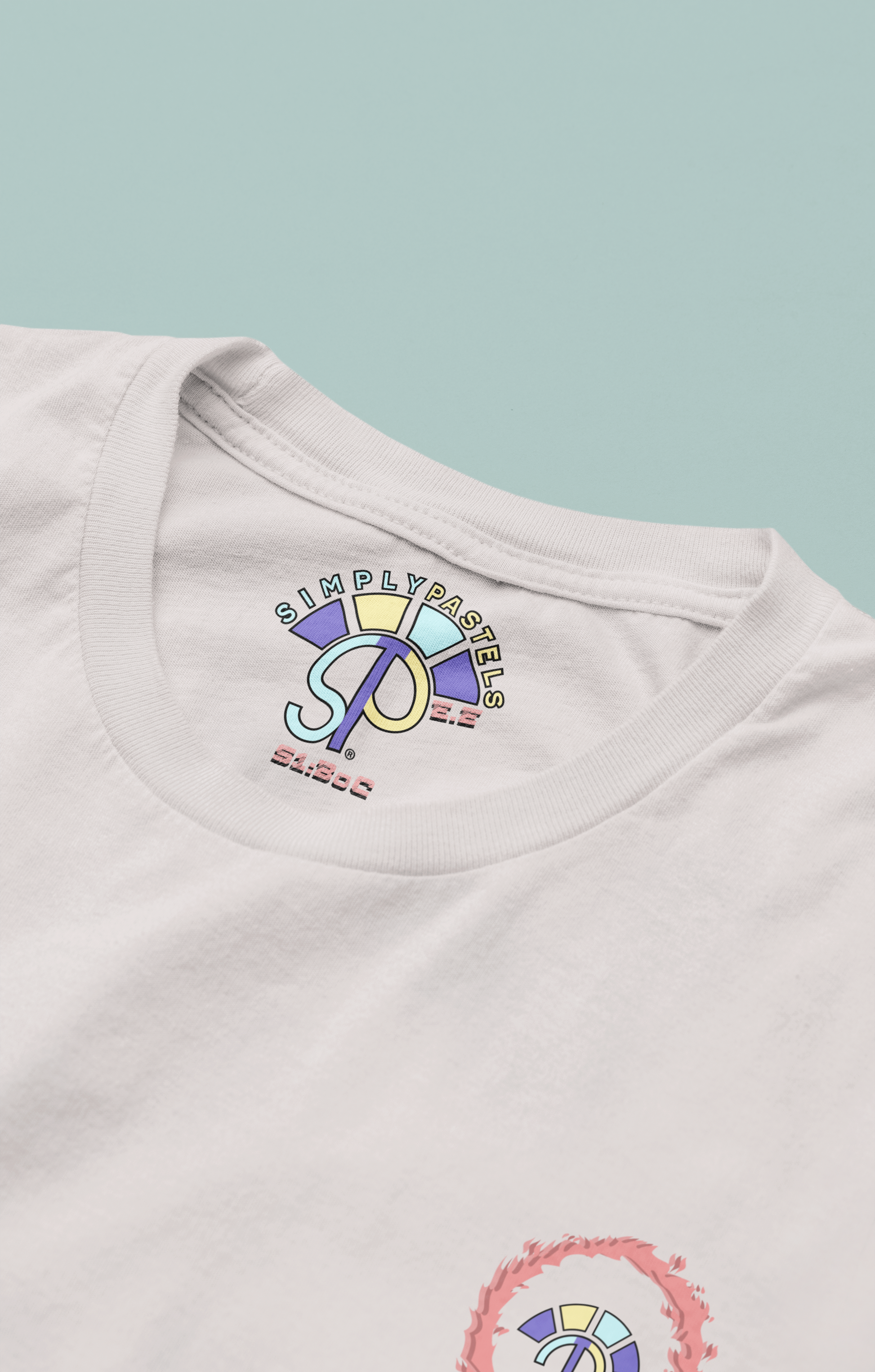 Label view of the off-white Eternal Essence organic cotton t-shirt with a pastel graphic design, from Simply Pastels, a UK-based premium ethical clothing brand.
