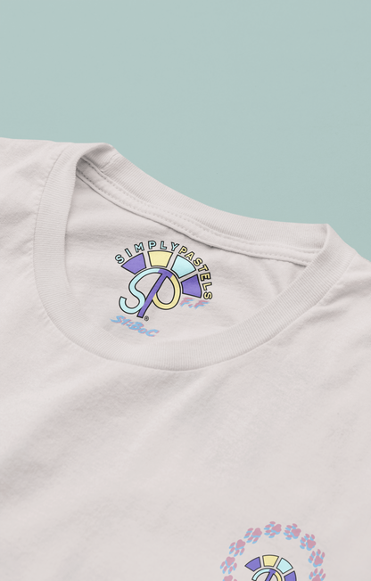 Label view of the off-white Firm Fortitude organic cotton t-shirt with a pastel graphic design, from Simply Pastels, a UK-based premium ethical clothing brand.